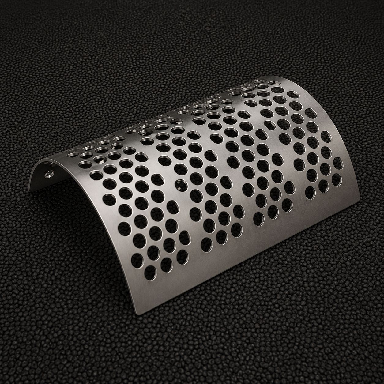 Shredder Screens for Industrial Shredding Machines | RSS Parts Shredder screen panel for industrial shredding machines with perforated steel design for efficient material sizing and separation